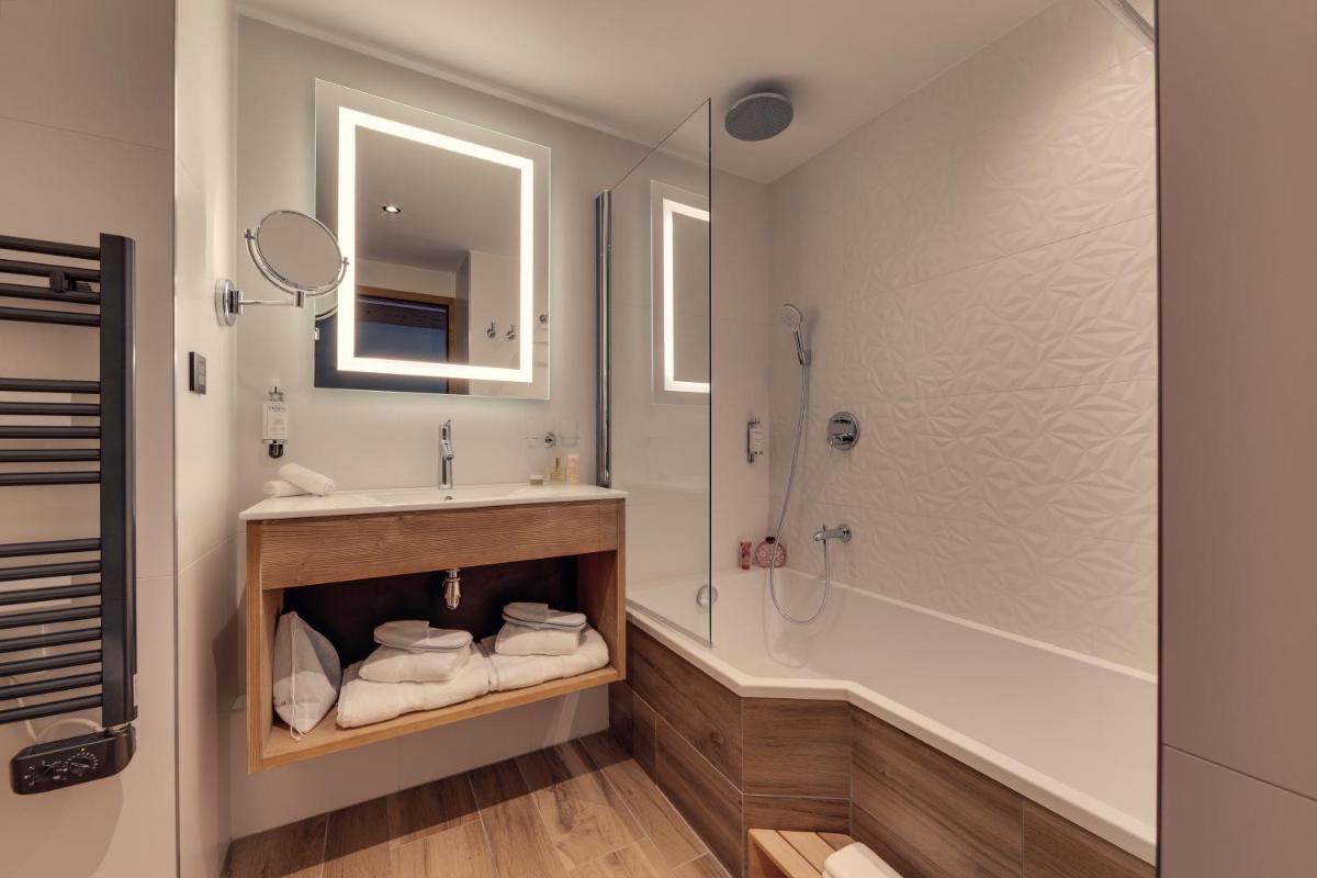 Salle de bains dans l'établissement Hôtel Avancher