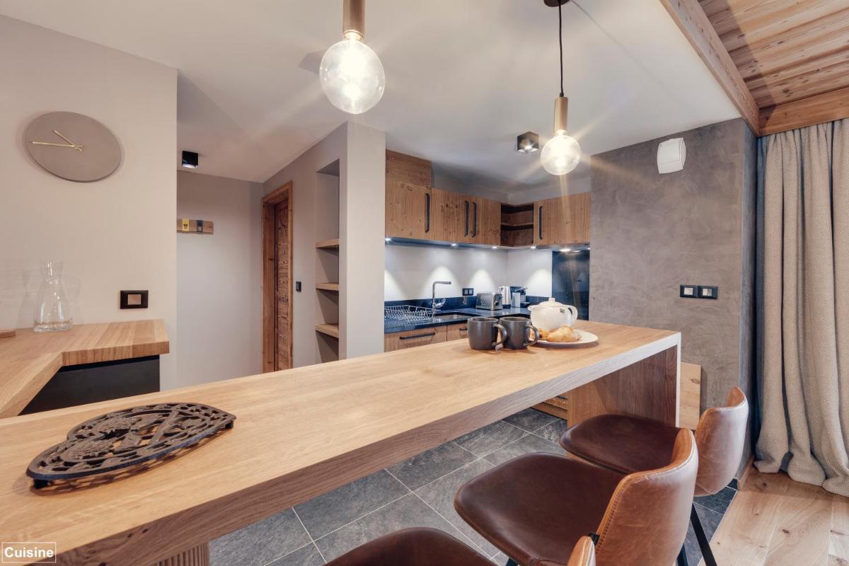 Cuisine ou kitchenette dans l'établissement Hôtel Avancher