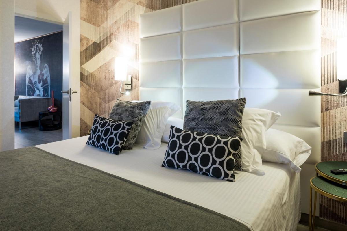 Cama o camas de una habitación en Ibiza Corso Hotel & Spa