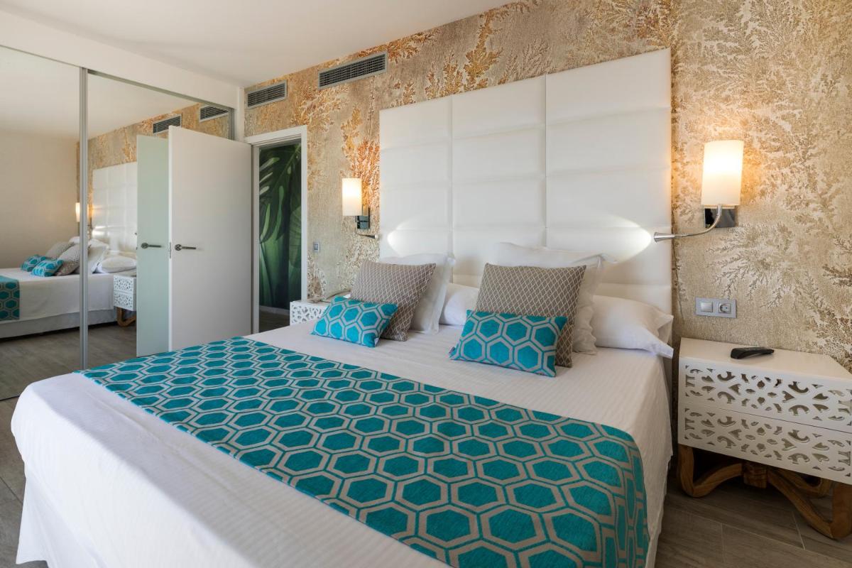 Cama o camas de una habitación en Ibiza Corso Hotel & Spa