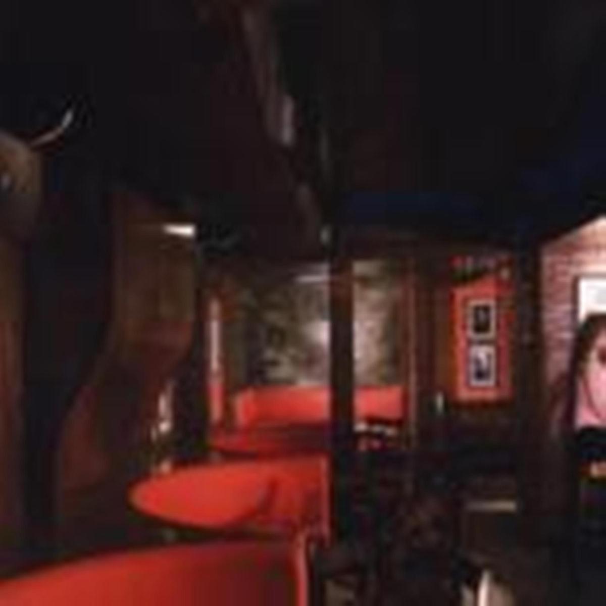 a blurry picture of a train with red seats at Hotel Hindusthan International, Kolkata in Kolkata