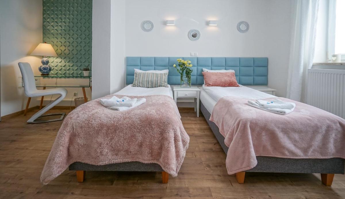 Happy Day Apartments - Housity