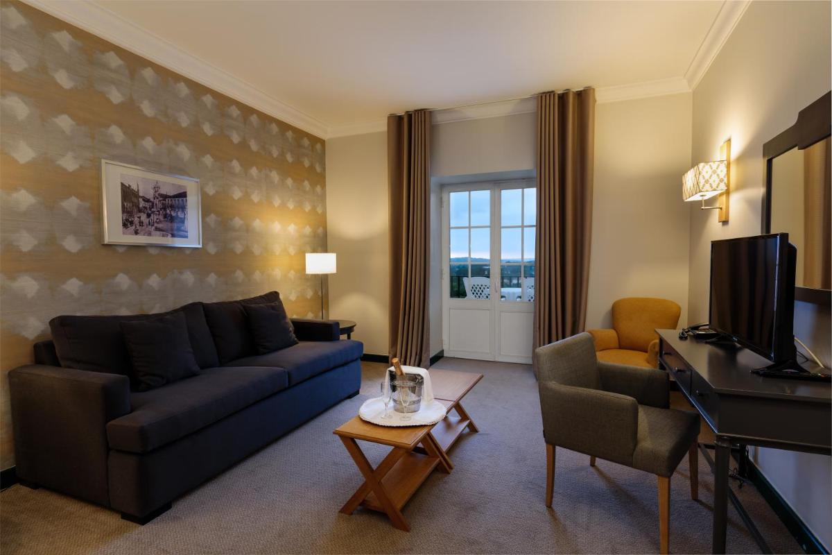 Uma área de estar em Conimbriga Hotel do Paço