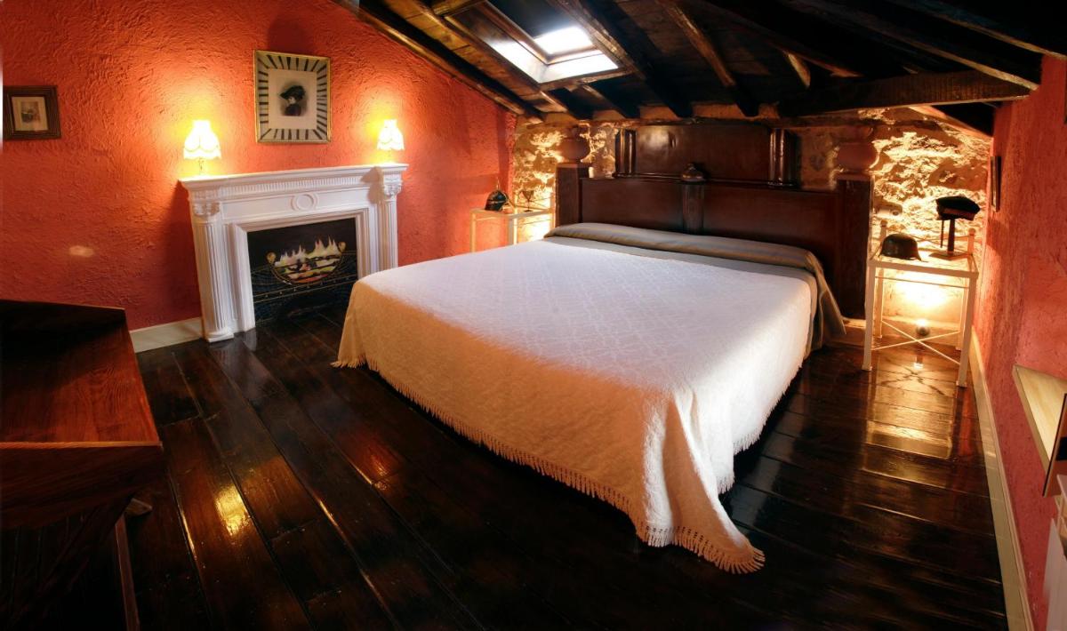 Cama o camas de una habitación en Posada del Indiano