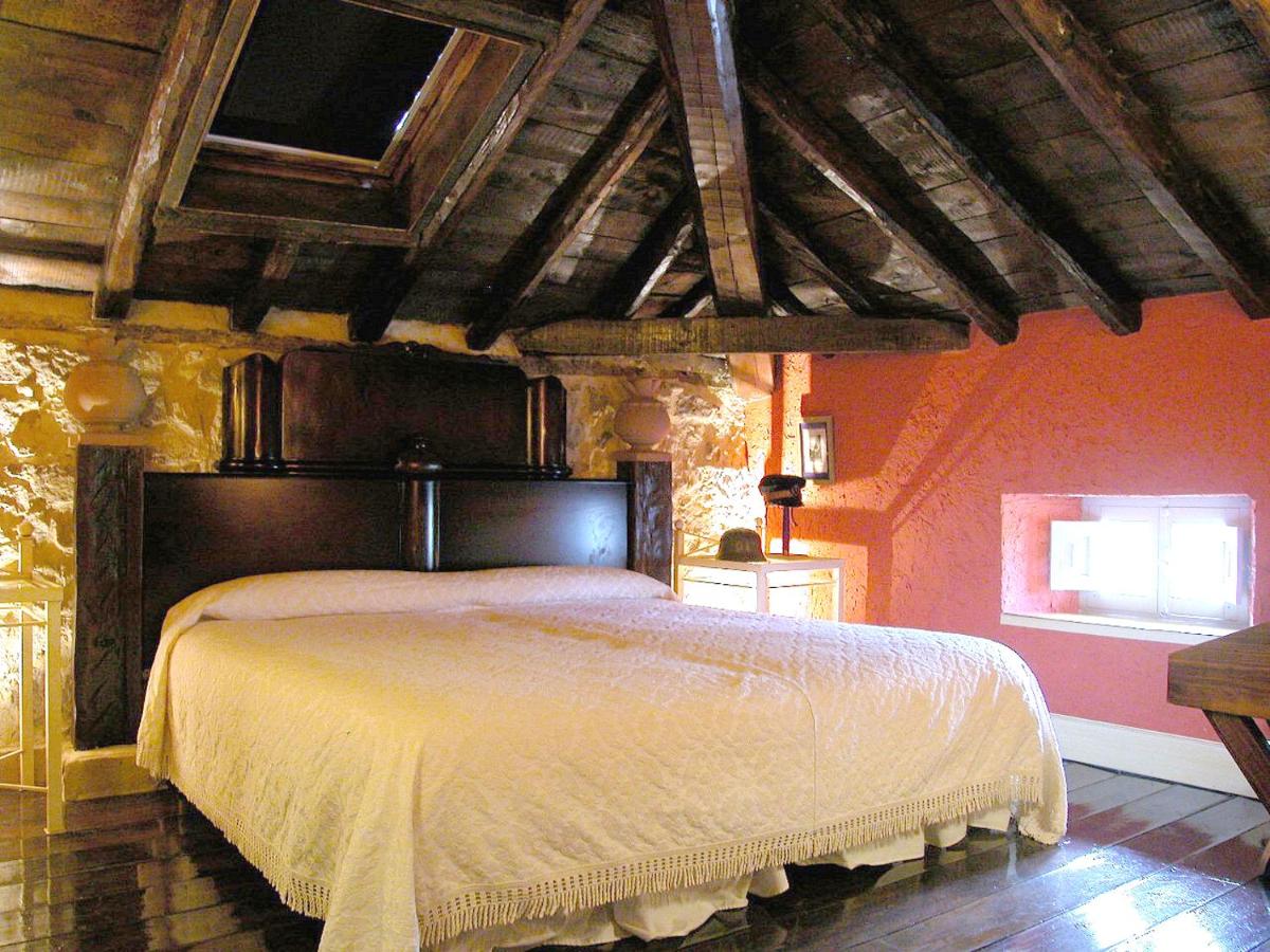 Cama o camas de una habitación en Posada del Indiano