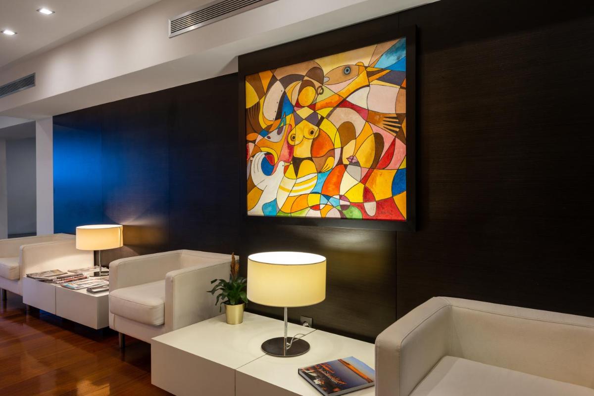 Uma área de estar em Hotel dos Zimbros