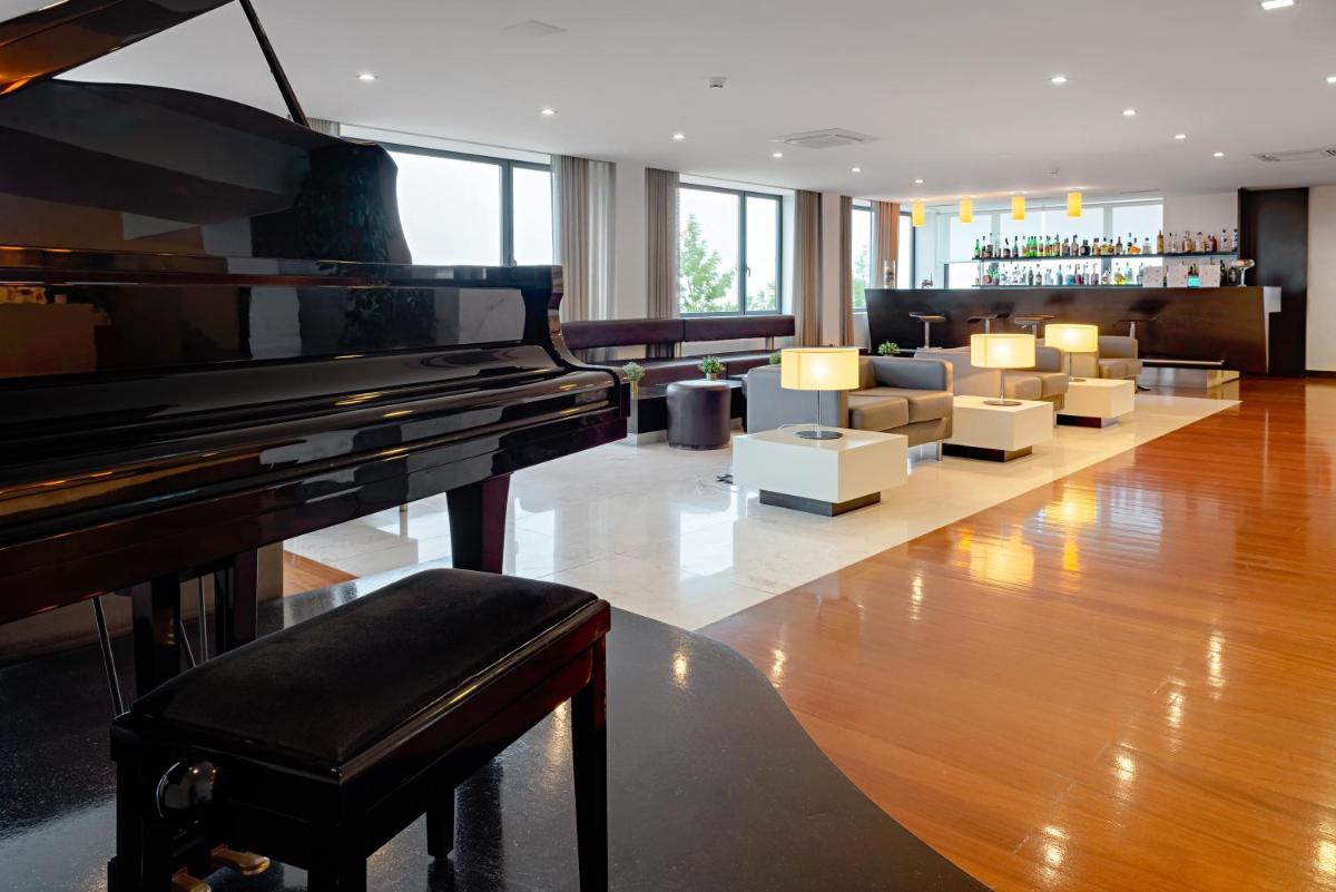 Uma área de estar em Hotel dos Zimbros