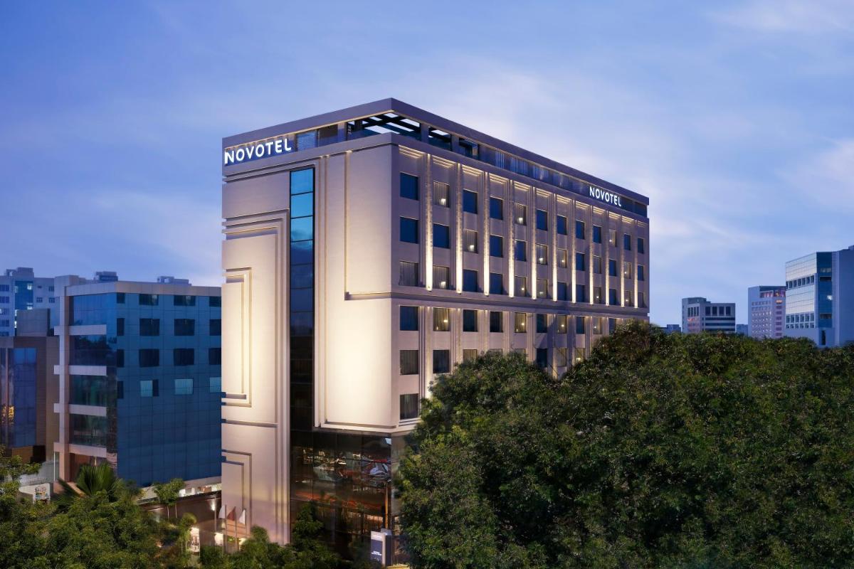 a building with a nordstrom sign on top of it at Novotel Chennai Chamiers Road in Chennai