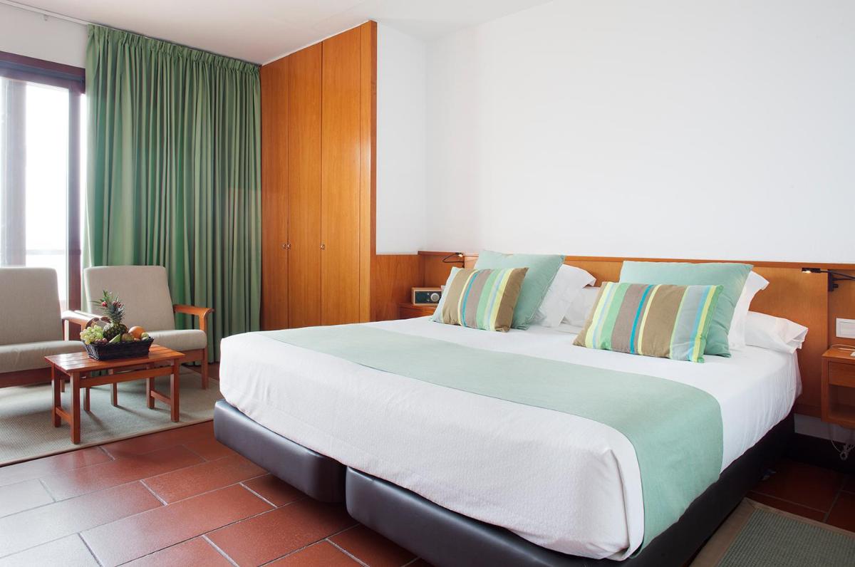 Cama o camas de una habitación en Almadraba Park Hotel