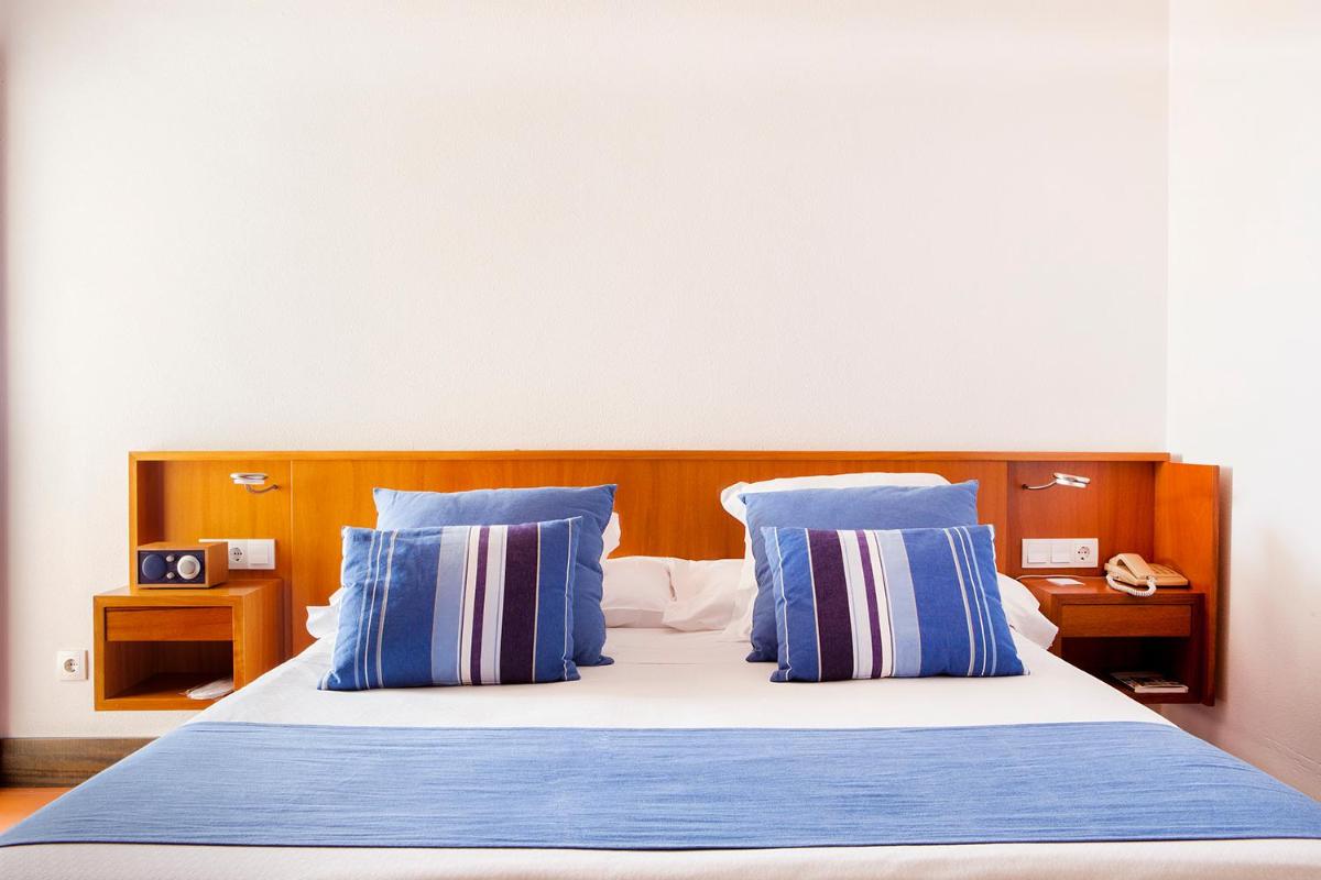 Cama o camas de una habitación en Almadraba Park Hotel