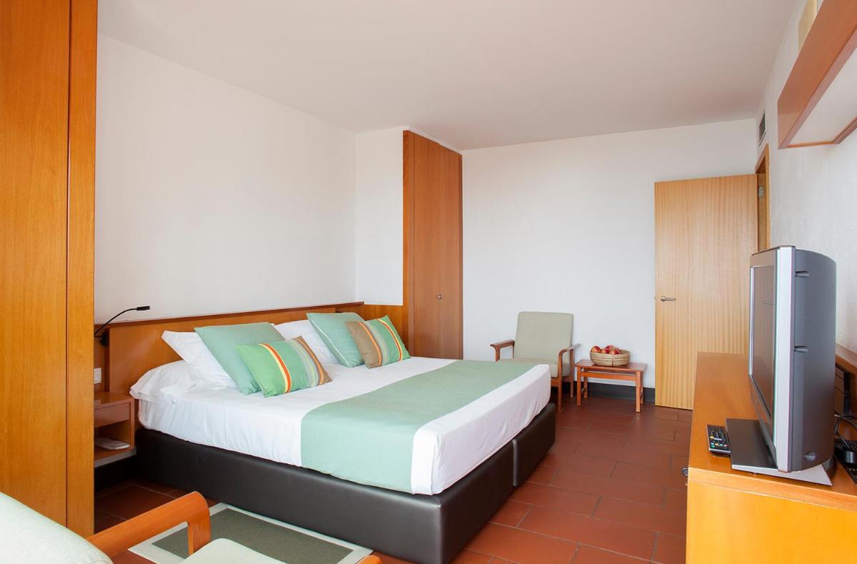 Cama o camas de una habitación en Almadraba Park Hotel