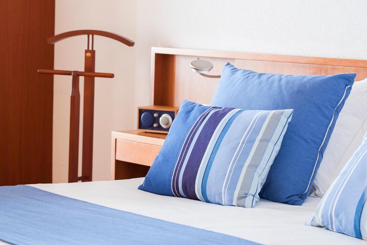 Cama o camas de una habitación en Almadraba Park Hotel