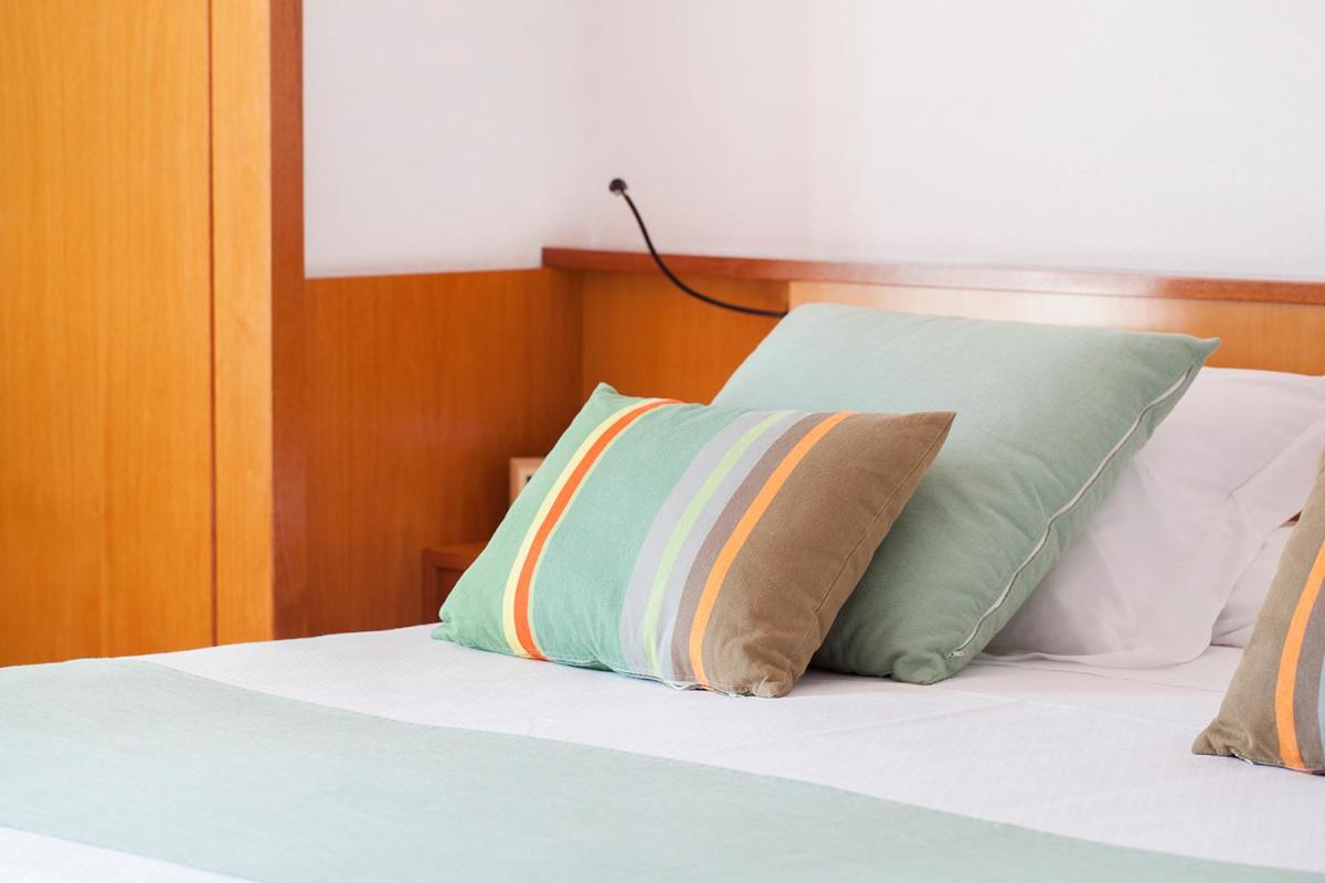 Cama o camas de una habitación en Almadraba Park Hotel