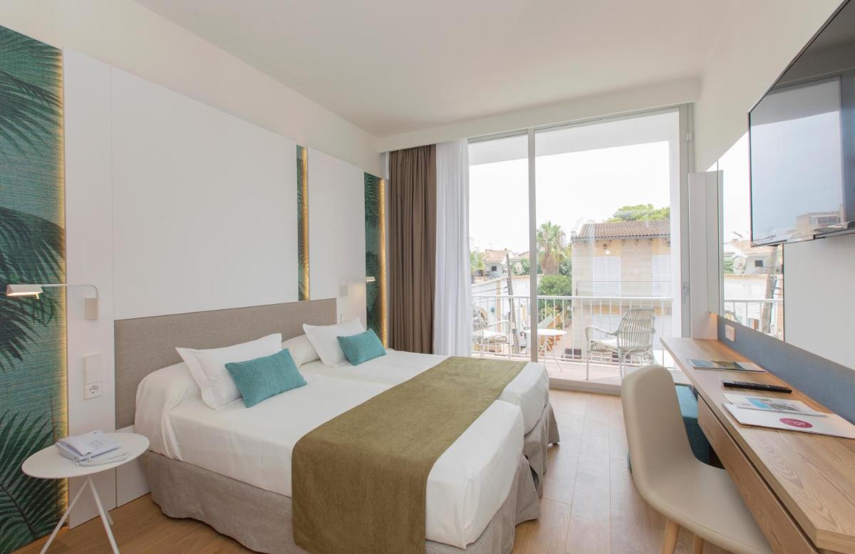 Cama o camas de una habitación en JS Yate
