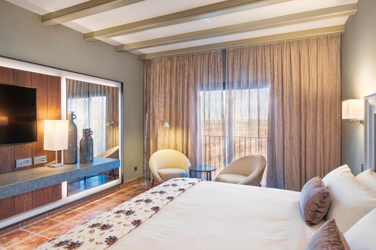 Cama o camas de una habitación en Hotel La Caminera Club de Campo