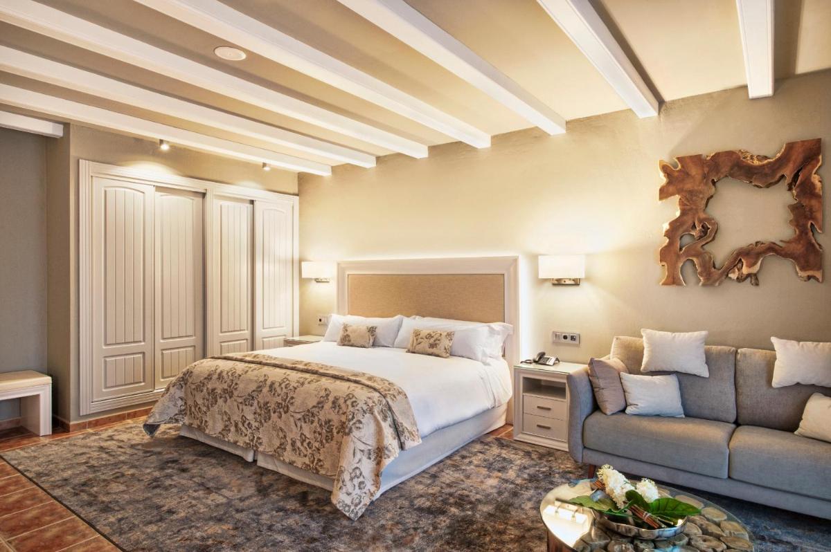 Cama o camas de una habitación en Hotel La Caminera Club de Campo