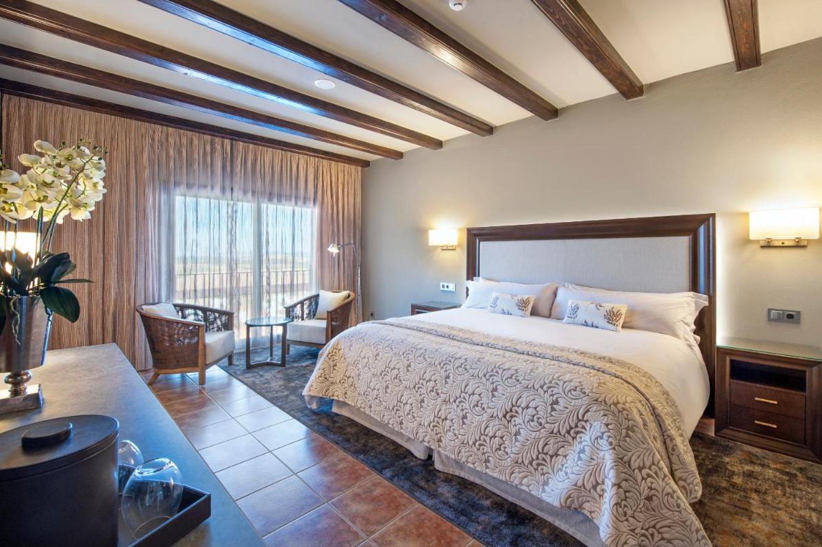 Cama o camas de una habitación en Hotel La Caminera Club de Campo