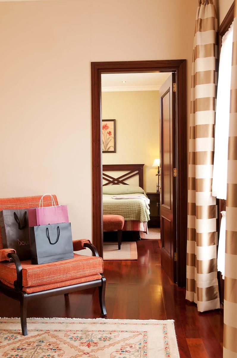 Cama o camas de una habitación en Laguna Nivaria Hotel & Spa
