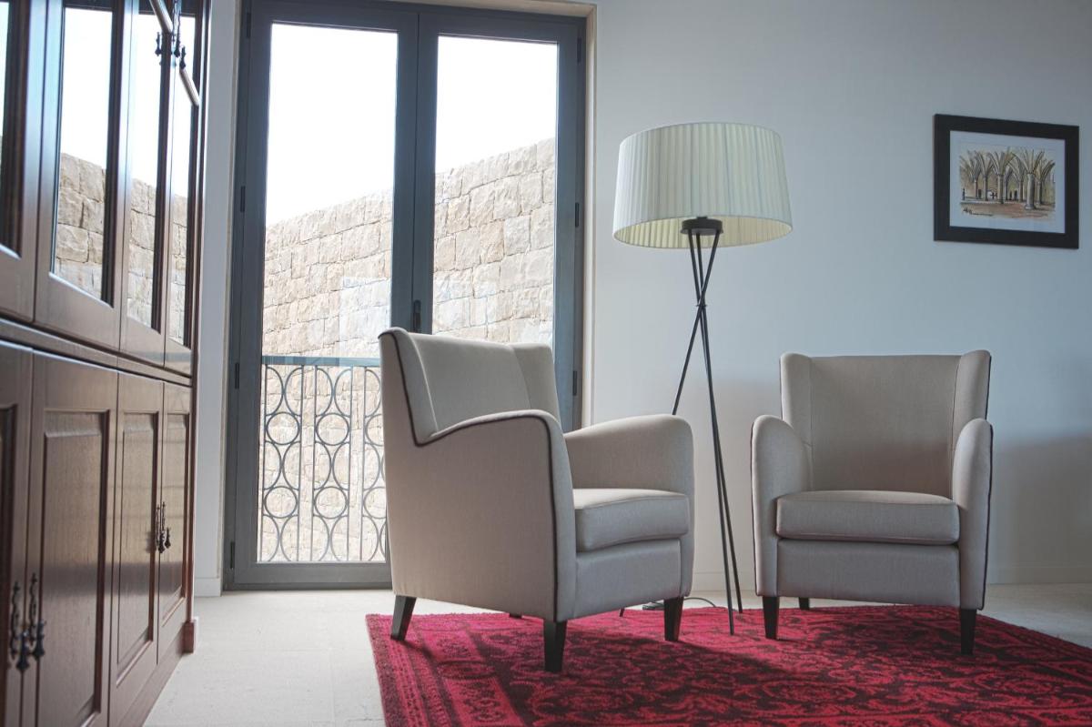 Uma área de estar em Real Abadia, Congress & Spa Hotel