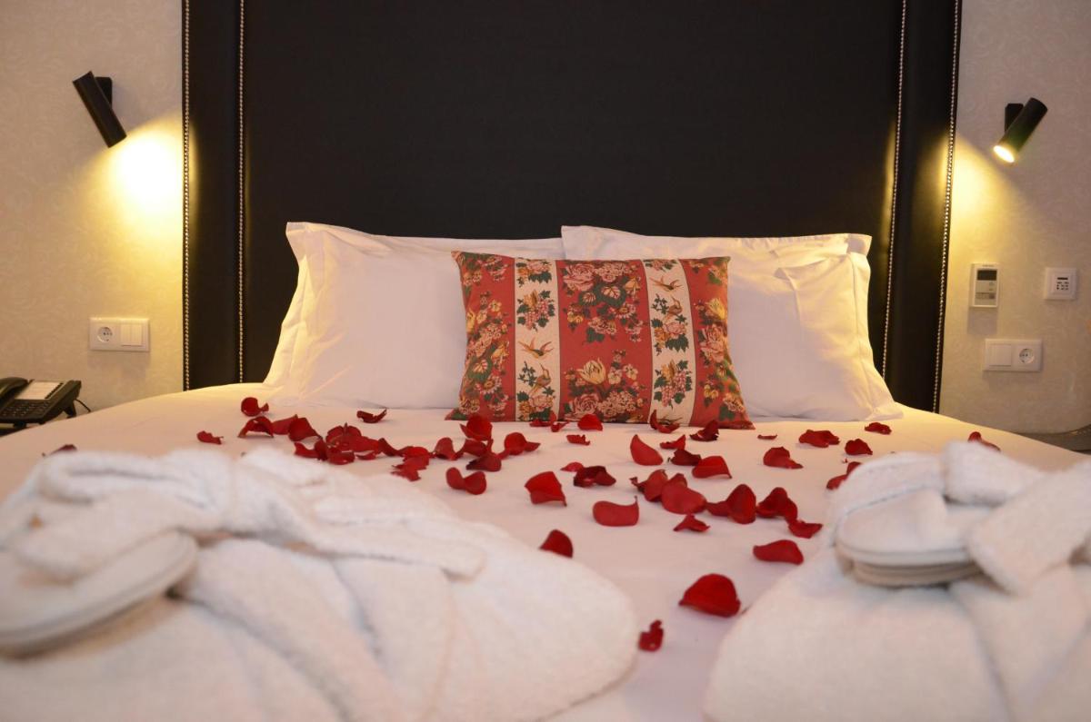 Uma cama ou camas num quarto em Lisotel - Hotel & Spa
