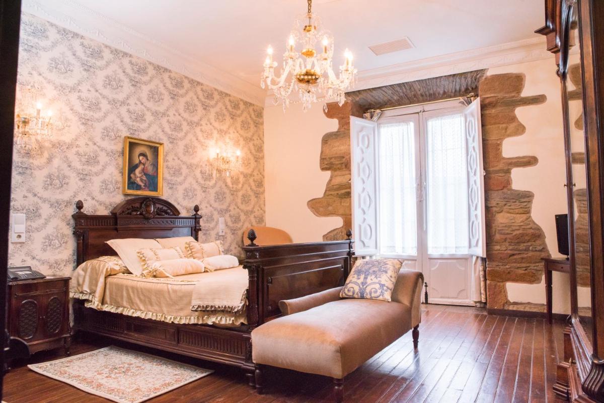 Cama o camas de una habitación en Hotel Monumento Pazo do Castro