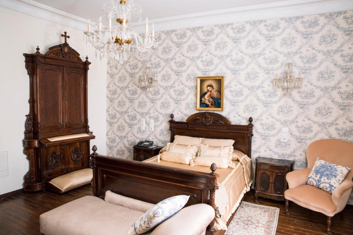 Cama o camas de una habitación en Hotel Monumento Pazo do Castro