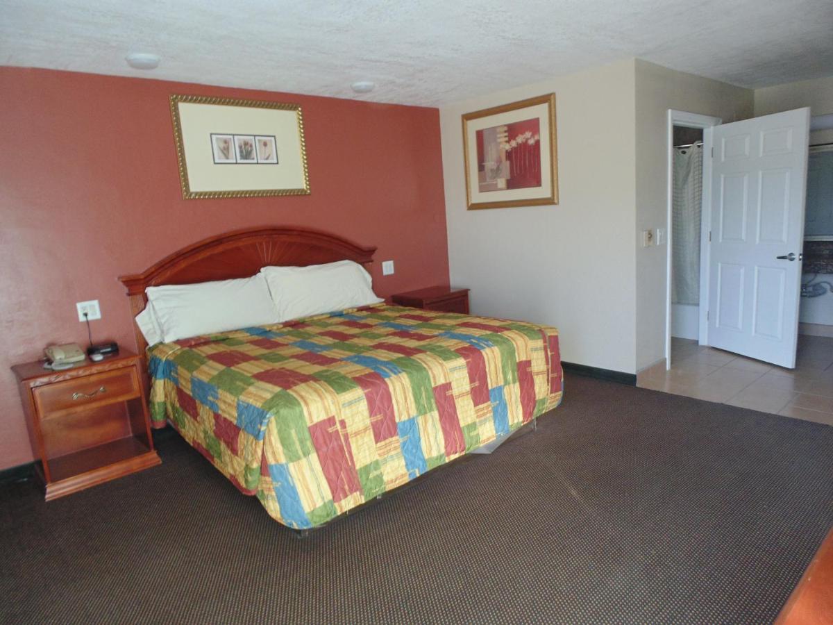 Western Inn & Suites - Housity