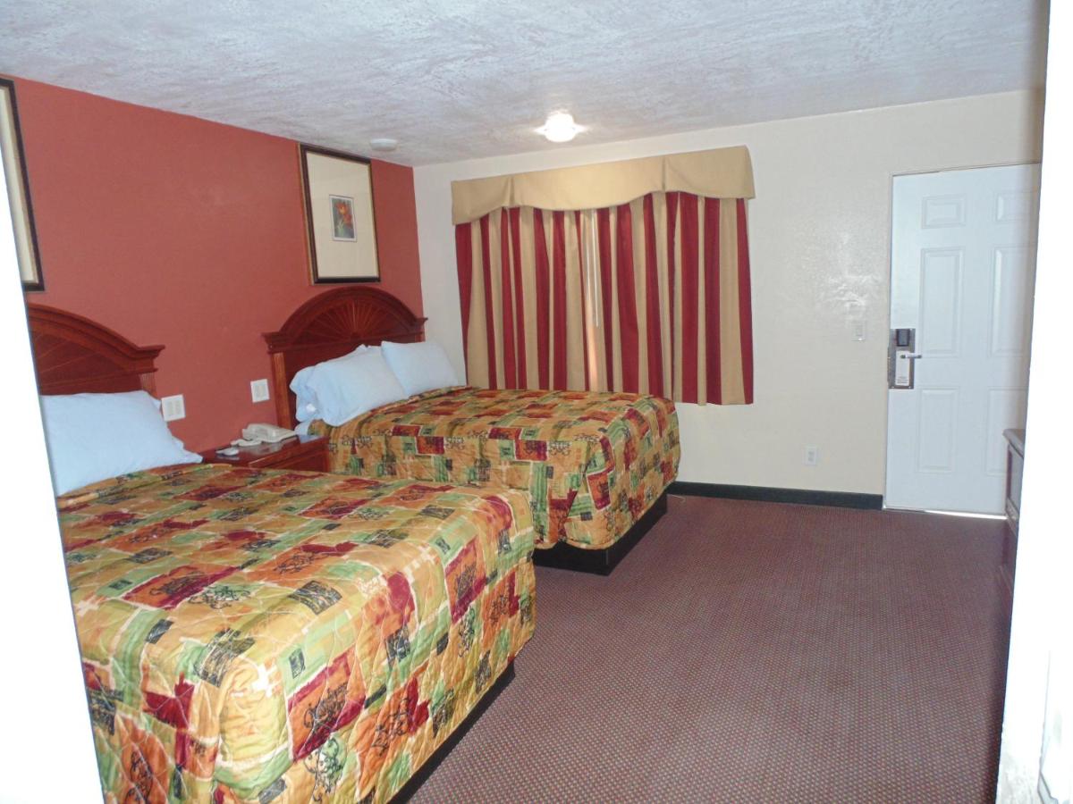 Western Inn & Suites - Housity