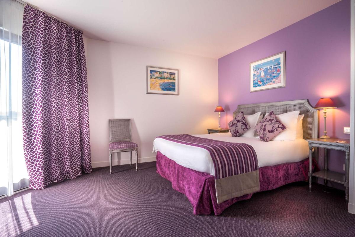 Un ou plusieurs lits dans un hébergement de l'établissement Best Western Plus Hostellerie Du Vallon