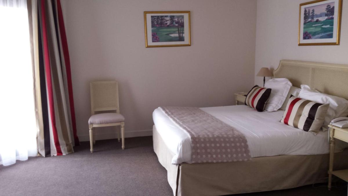 Un ou plusieurs lits dans un hébergement de l'établissement Best Western Plus Hostellerie Du Vallon