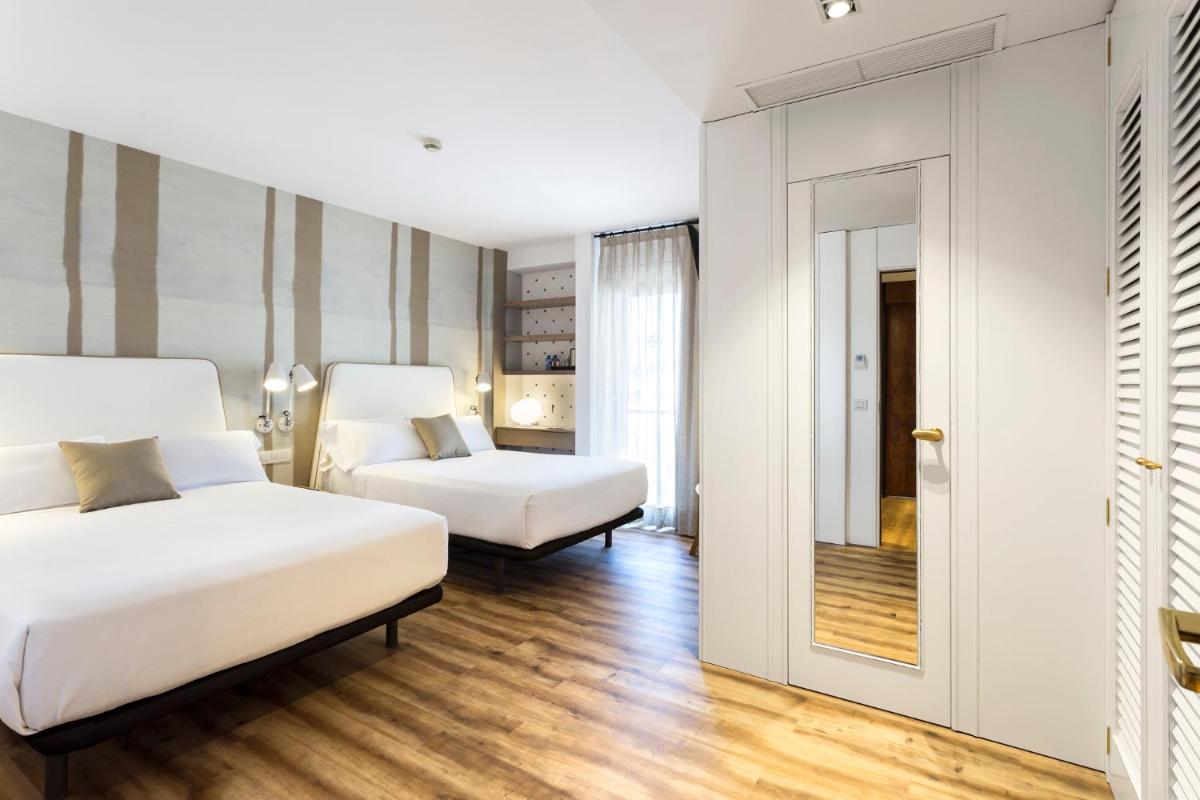 Cama o camas de una habitación en Hotel Anabel