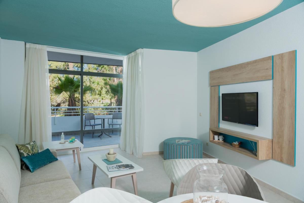 Zona de estar de Gara Suites Golf & Spa