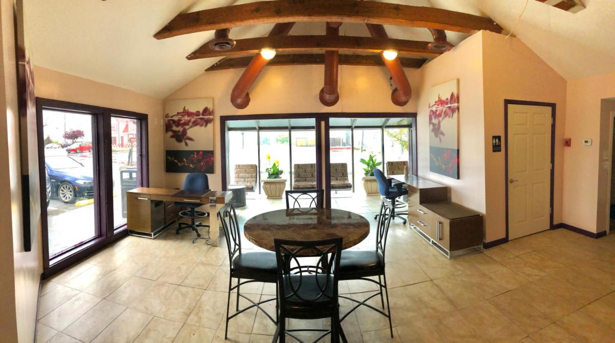 APM Inn and Suites - Housity