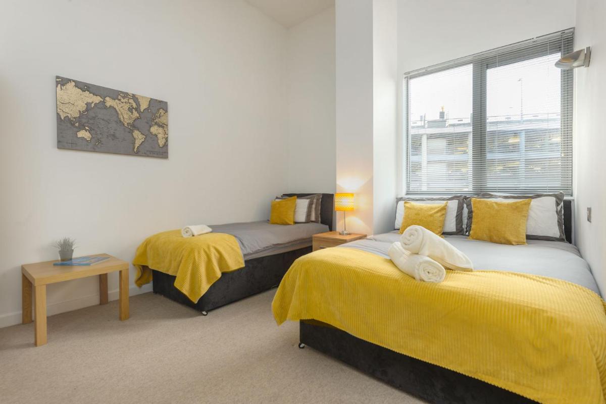 Suitetrails - Central Lofts Apartment