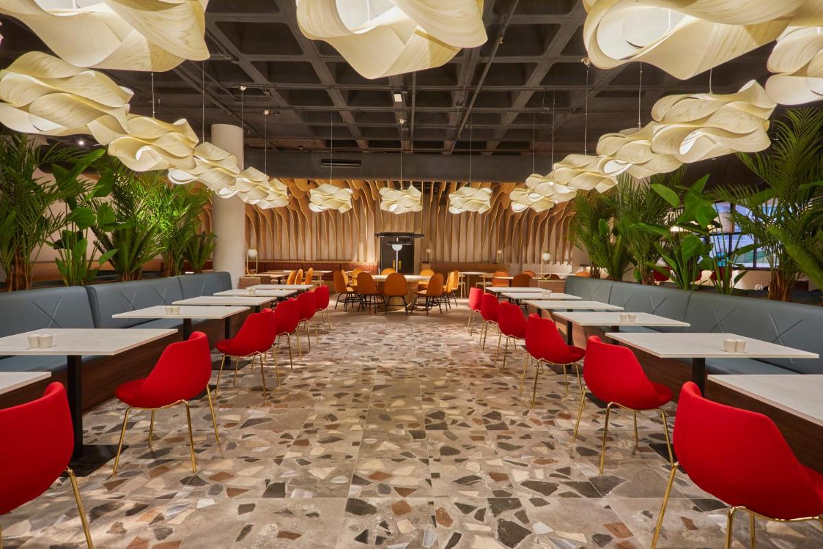 Un restaurante o sitio para comer en Bahia Principe Fantasia Tenerife - All Inclusive