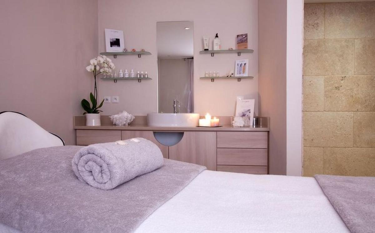 Un ou plusieurs lits dans un hébergement de l'établissement Le Cottage - Hotel & Spa