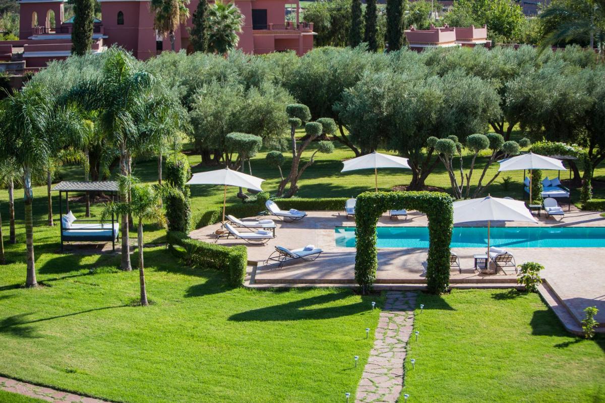 Villa Koutoubia, jardin luxuriant, piscine et spa - Housity