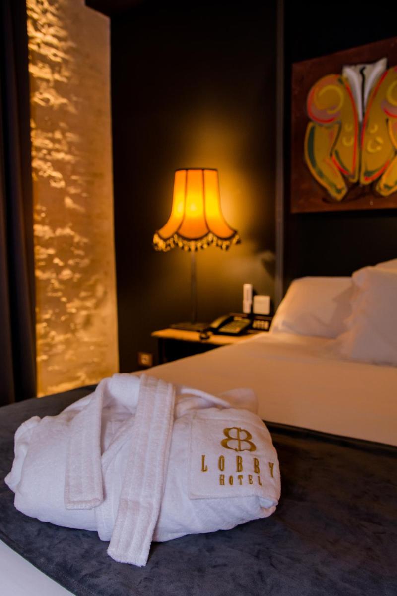 Cama o camas de una habitación en Hotel Lobby