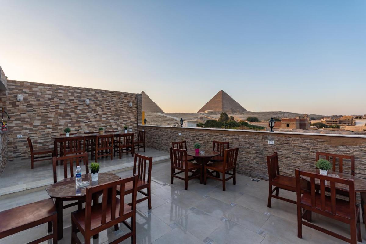 Pyramids Village Inn - Housity