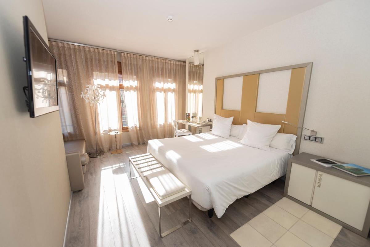 Cama o camas de una habitación en Hotel & Spa Princesa Munia