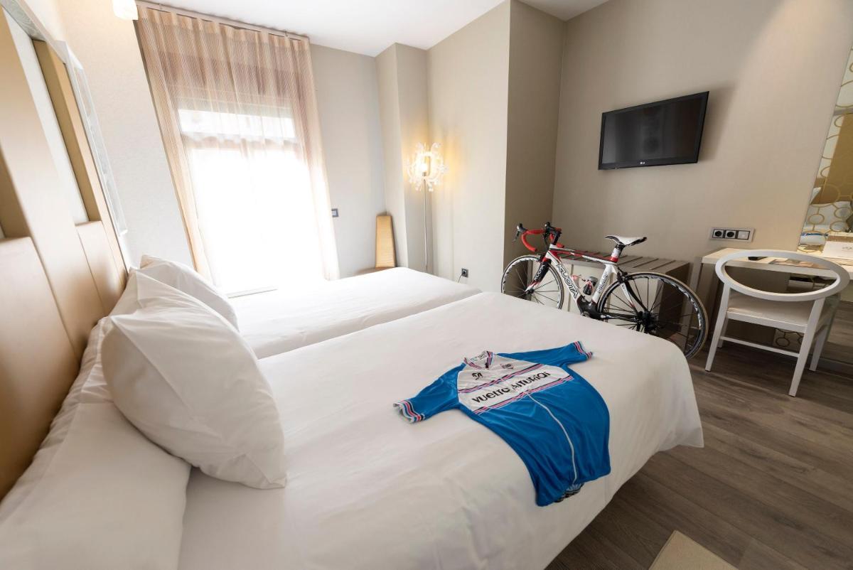 Cama o camas de una habitación en Hotel & Spa Princesa Munia
