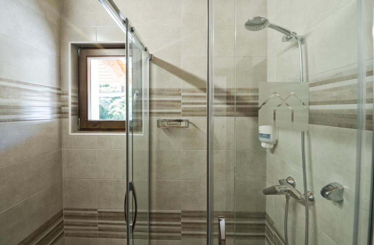 Un baño de Hotel Rural Las Montañas de Pumar