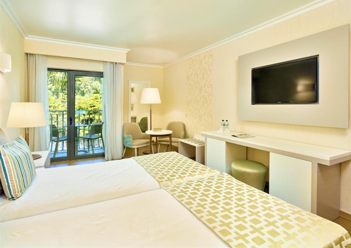 Uma cama ou camas num quarto em Hotel Baia Grande