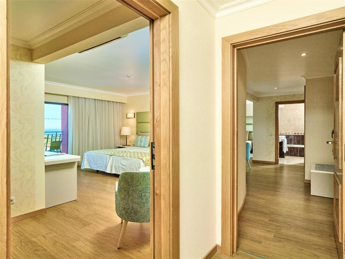Uma cama ou camas num quarto em Hotel Baia Grande
