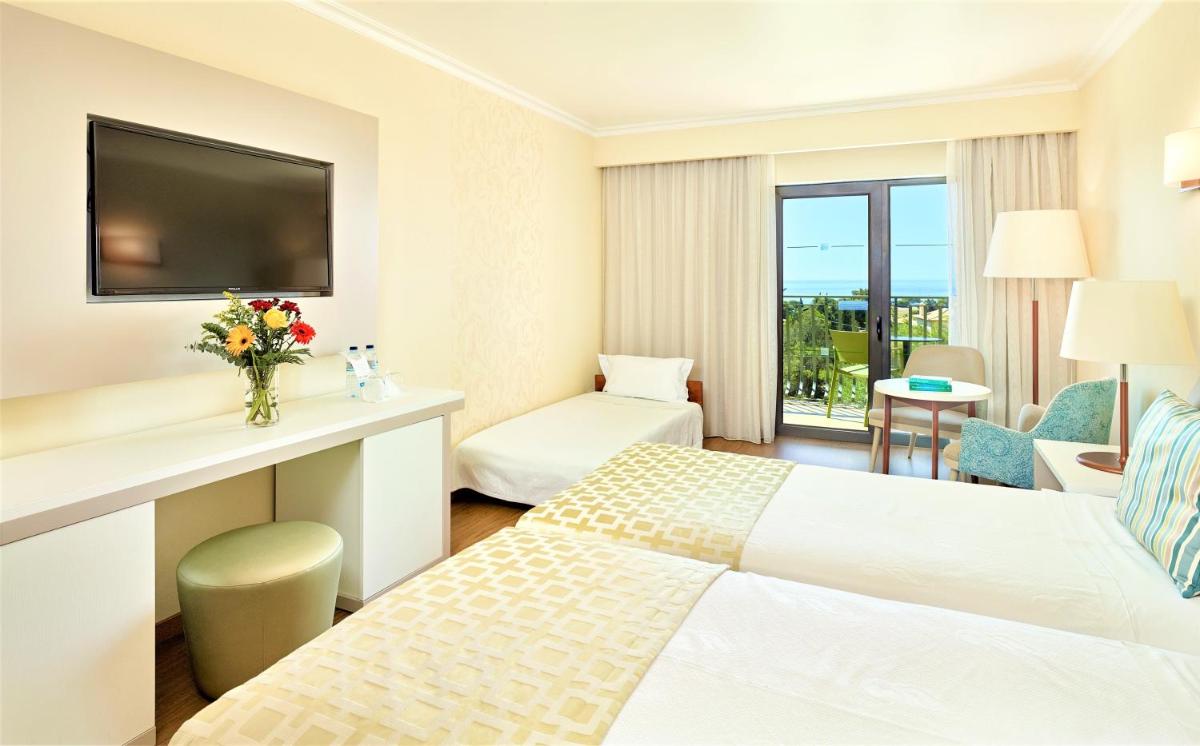 Uma cama ou camas num quarto em Hotel Baia Grande