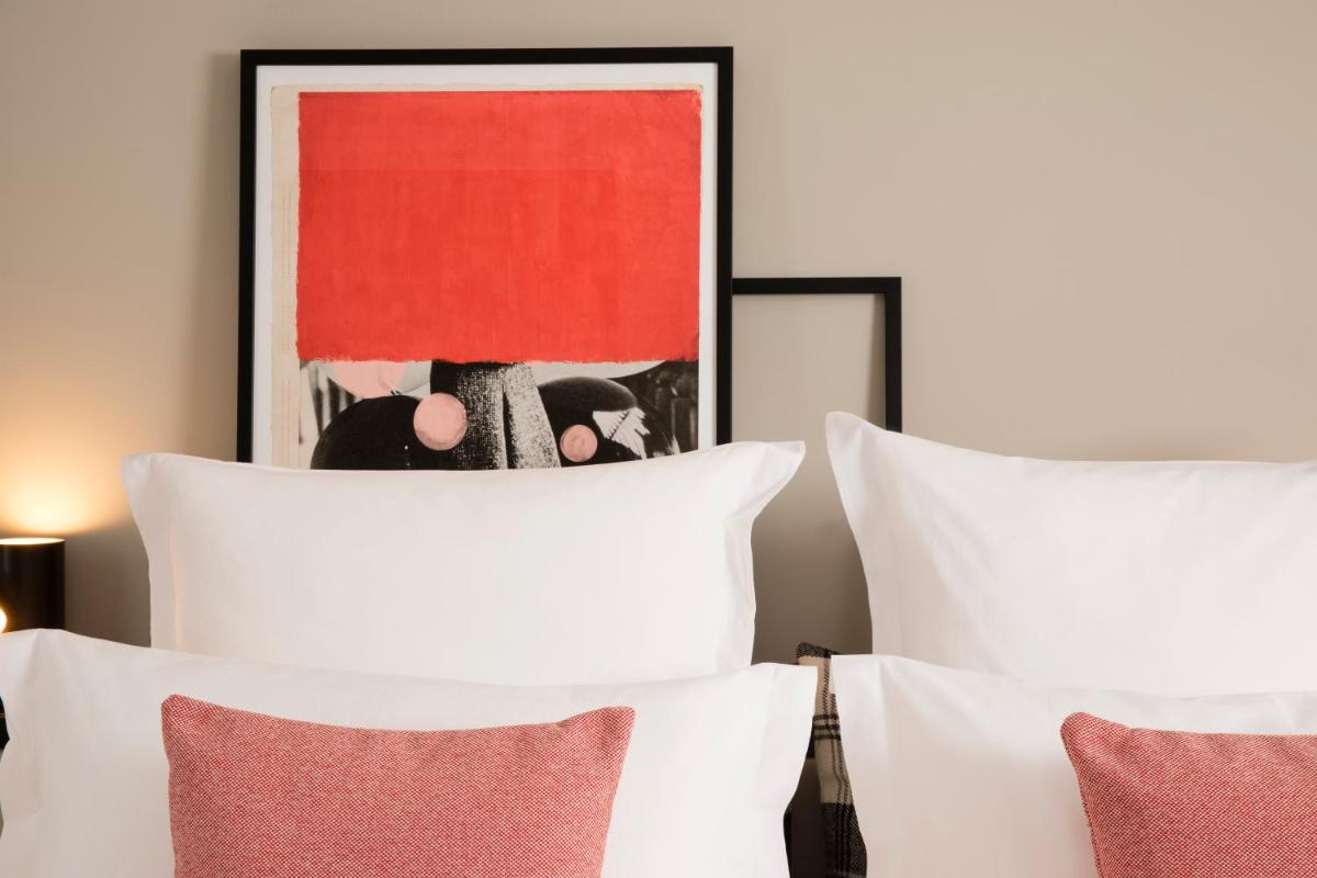 Un ou plusieurs lits dans un hébergement de l'établissement Maison ELLE Paris