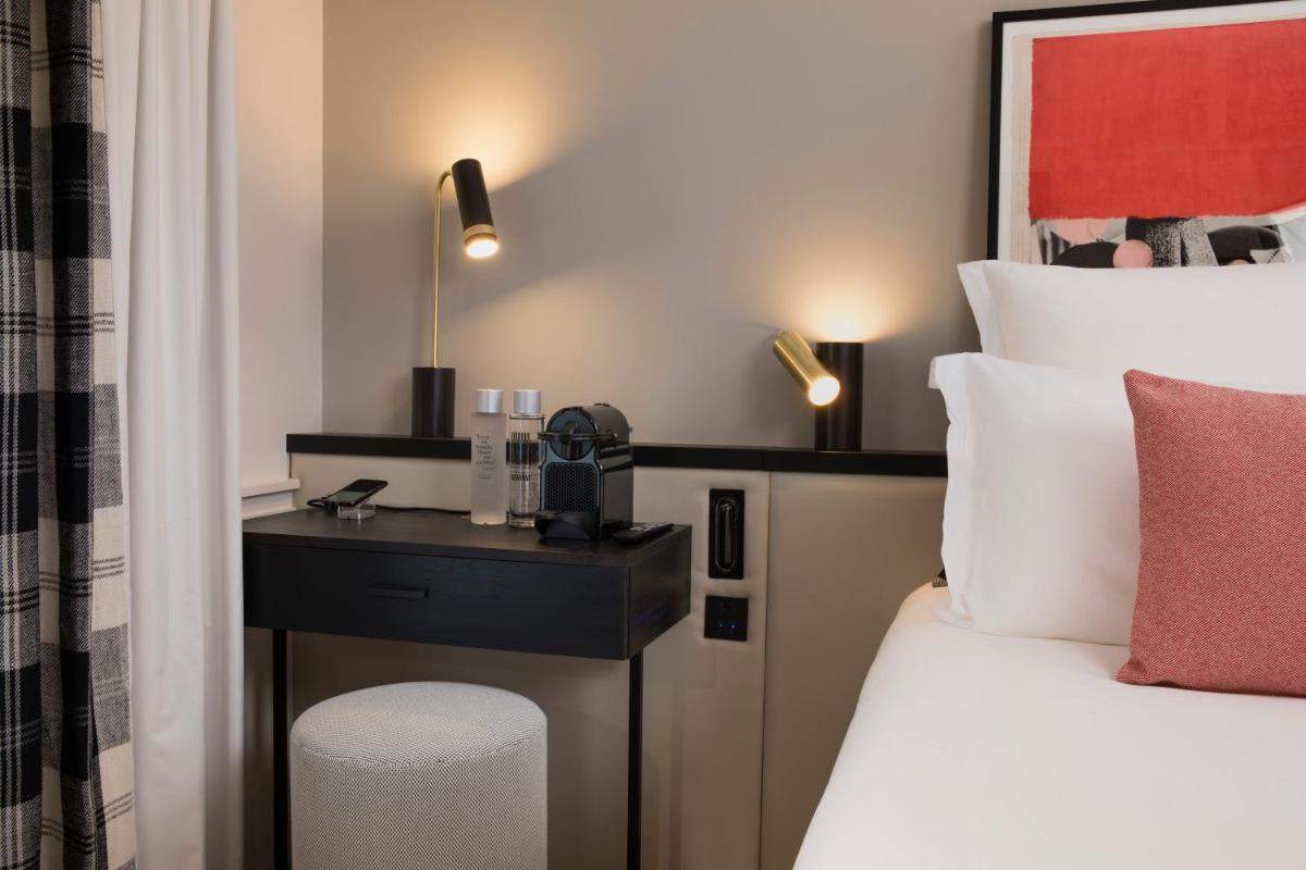 Un ou plusieurs lits dans un hébergement de l'établissement Maison ELLE Paris