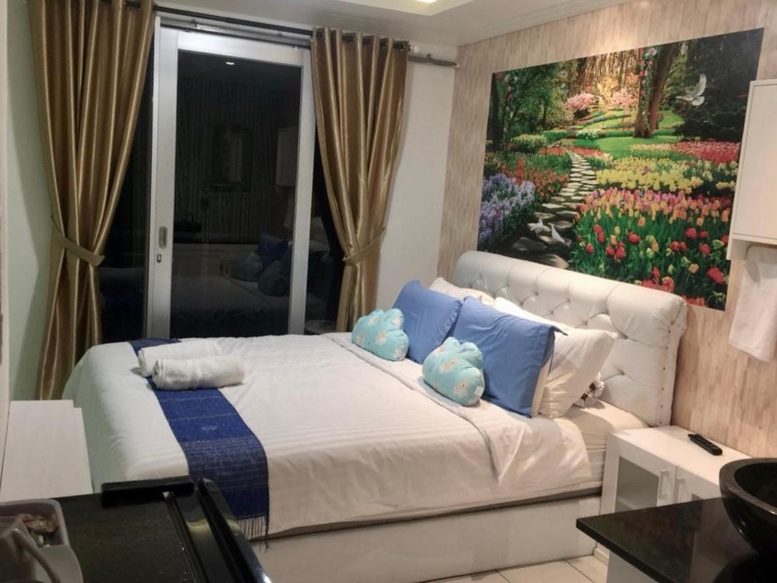 Apartment Grand Asia Afrika Tulip Bandung - Housity