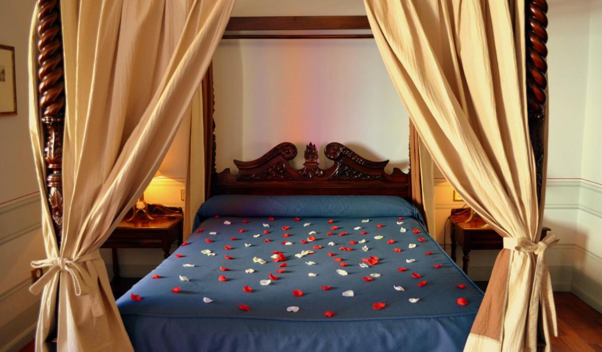 Cama o camas de una habitación en Hotel Mirador de Llerena