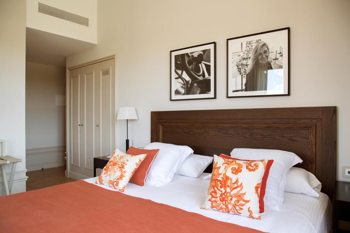 Cama o camas de una habitación en Casa Anamaria Hotel